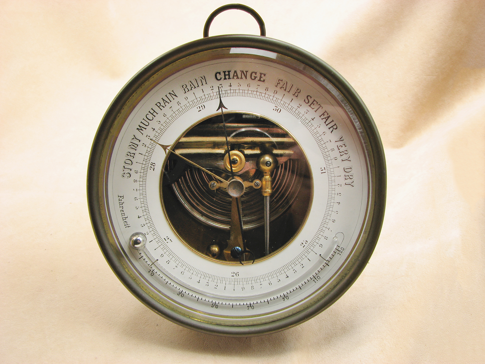 19th century aneroid barometer with curved thermometer